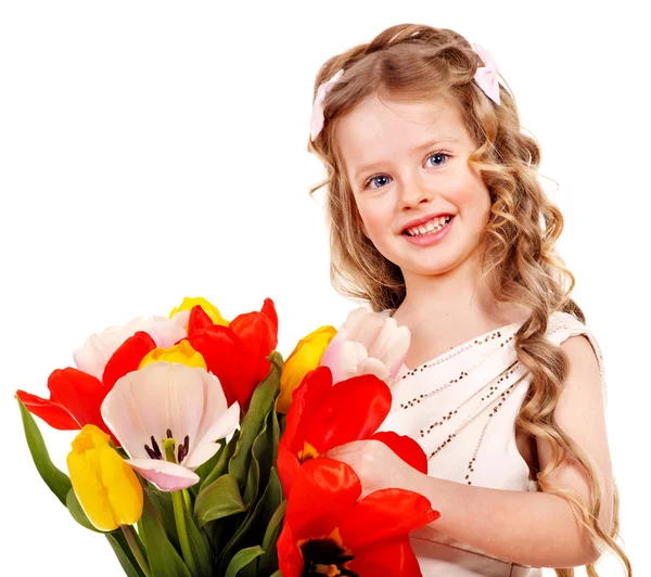Dítě s jarní květ. — Stock fotografie
