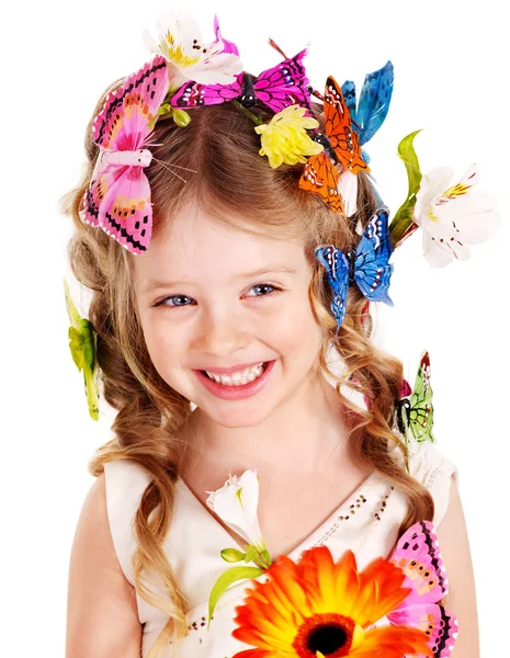 Dítě v jarní účes a motýl. — Stock fotografie