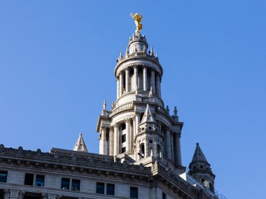 Detail of statue on Manhattan Municipal building clipart