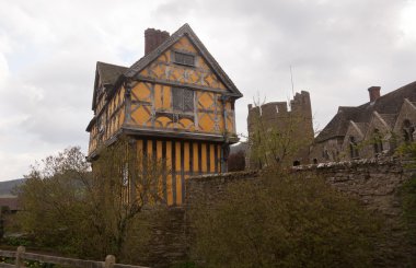 Stokesay Castle in Shropshire on cloudy day clipart