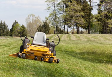 Zero turn lawn mower on turf with no driver clipart