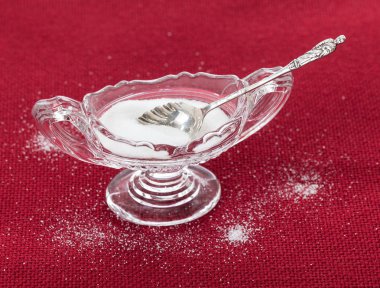 Cut glass bowl full of table salt clipart