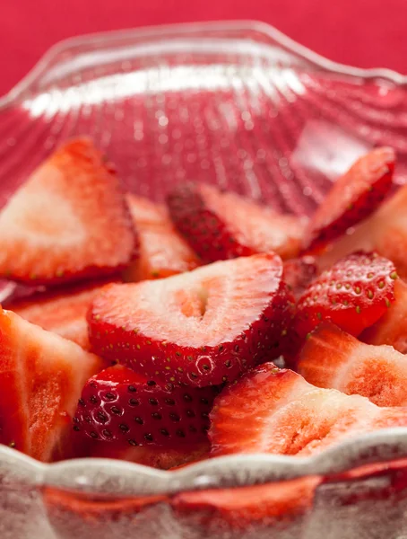 Fresh sliced strawberries in glass dish — Stock Photo, Image