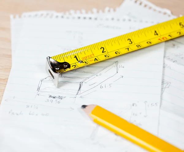 stock image Carpenter pencil and rule on plans