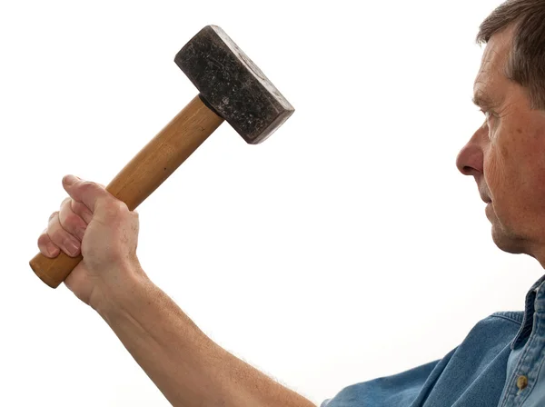 Hombre mayor sosteniendo un martillo grande —  Fotos de Stock