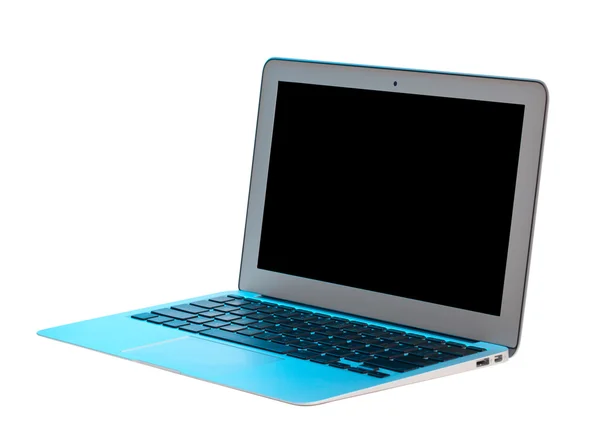 Zilveren laptop verlicht met blauwe tint — Stockfoto