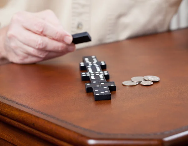 Game of dominoes on leather table — Stock Photo, Image