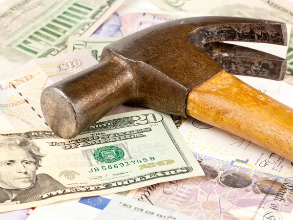Hammer on top of dollar note — Stock Photo, Image