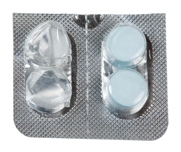 Foil packet for tablets with two blue tablets — Stock Photo, Image