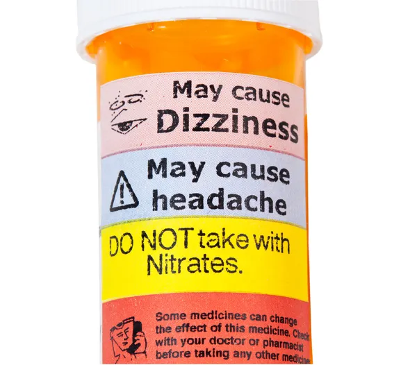 Señales de advertencia en frasco de drogas rx — Foto de Stock