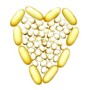 Heart shape made from fish oil capsules clipart