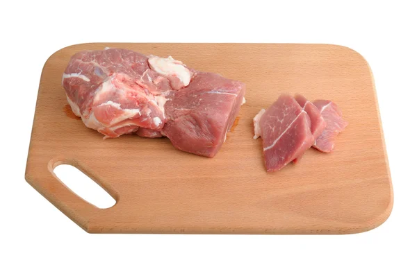 Mięso na drewnianej desce — Zdjęcie stockowe