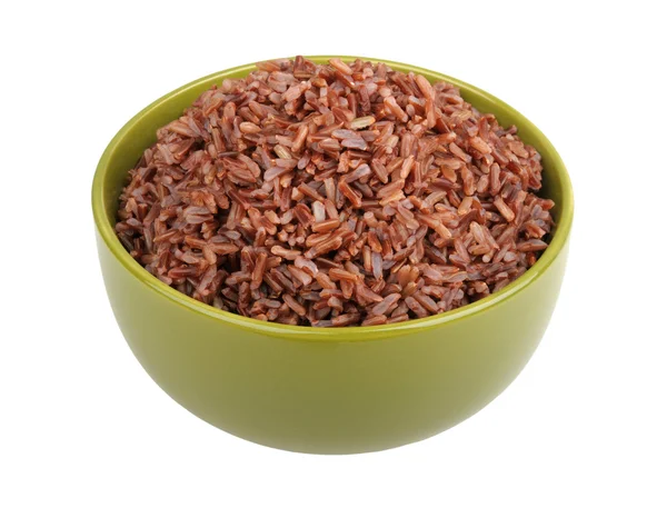 Red rice in a green bowl — Stock Photo, Image