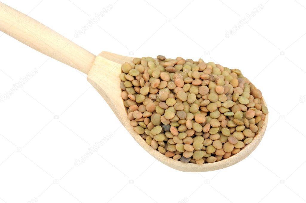 Lentils in wooden spoon