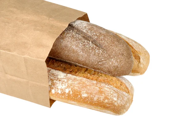 호 밀 빵과 밀 빵 종이 봉지에 — 스톡 사진
