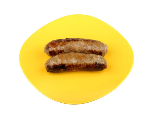 Grilled sausage on a plate — Stock Photo, Image