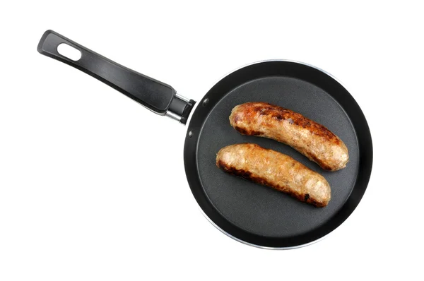 Fried sausage in a frying pan — Stock Photo, Image