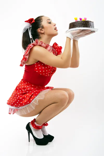 A young woman with chokolate cake. — Stock Photo, Image