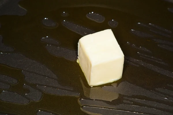Smažení másla — Stock fotografie