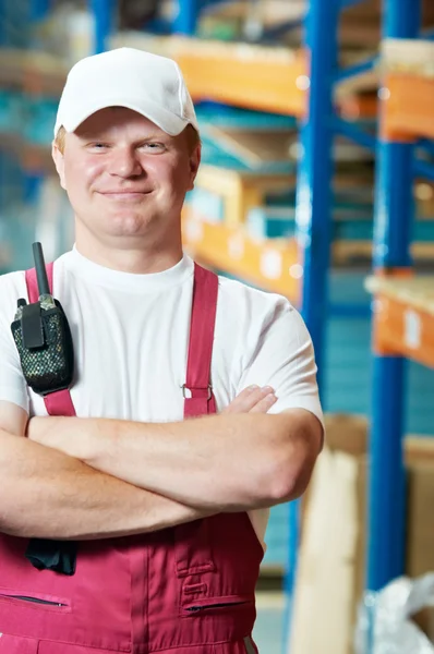 Caucasian young manual worker in warehouse — Stock Photo, Image