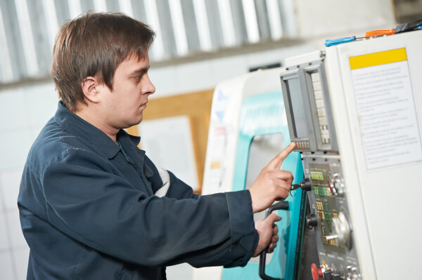 Worker at tool workshop