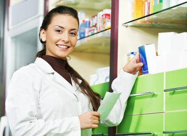 Pharmacy chemist woman in drugstore clipart