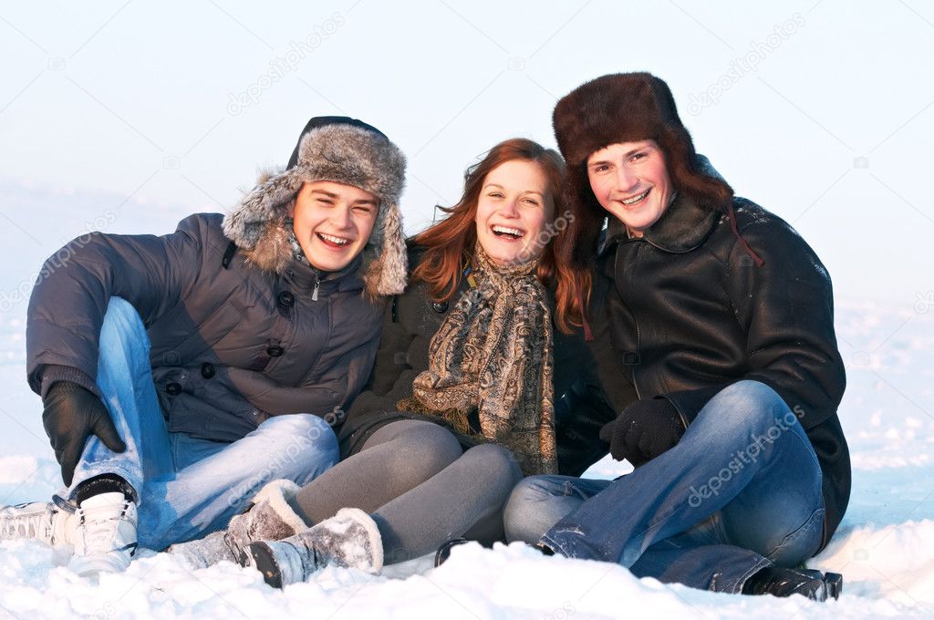 Group of happy young in winter