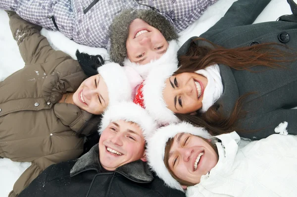 Group of happy young in winter — Stock Photo, Image