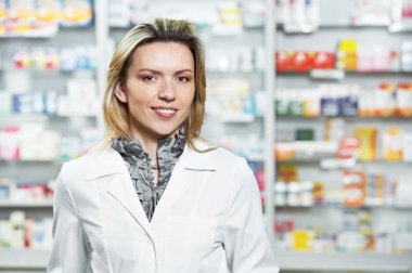 Pharmacy chemist woman in drugstore clipart