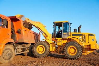 Wheel loader excavator and tipper dumper clipart