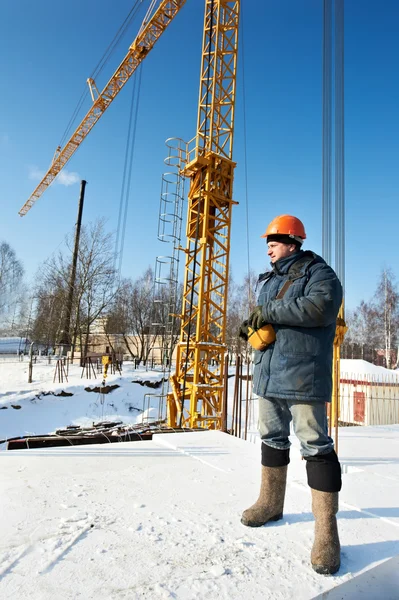 stock image Worker with tower crane remote control equipment