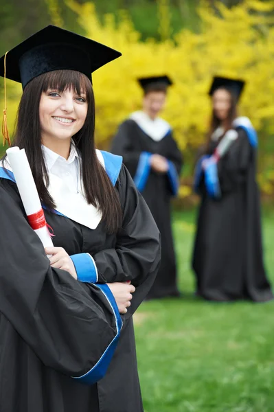 Happy graduation students — Stock Photo, Image