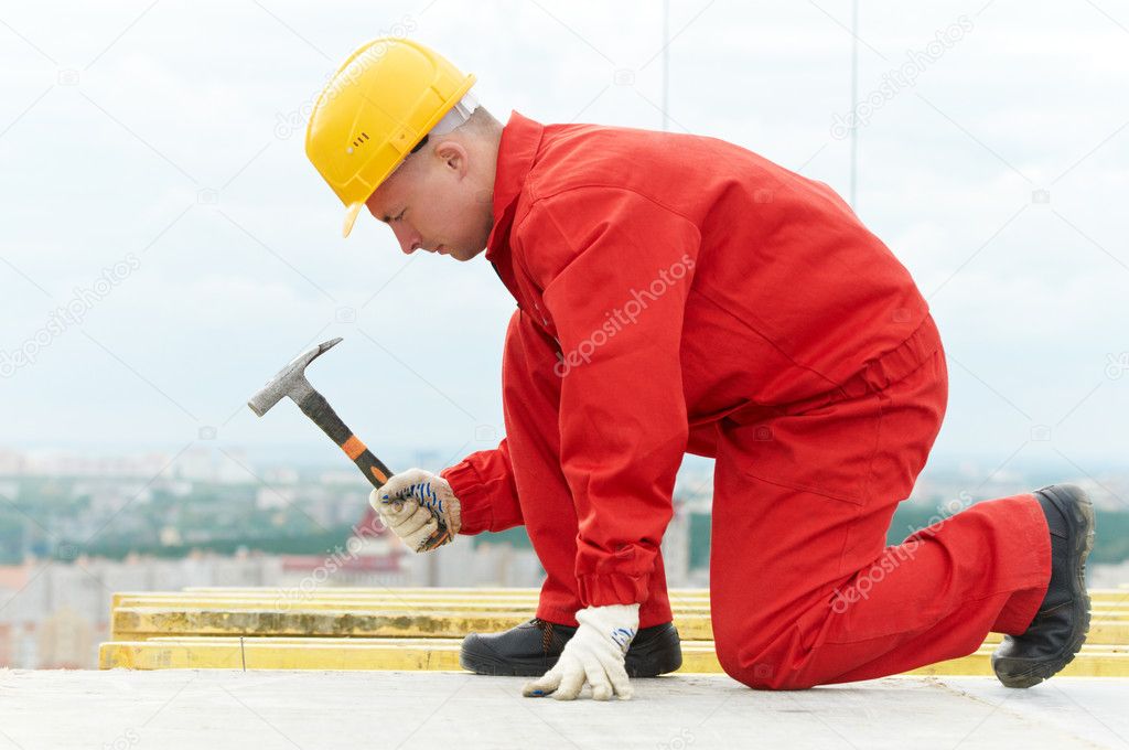 Builder making construction works