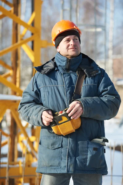 Builder with tower crane remote control equipment — Stock Photo, Image