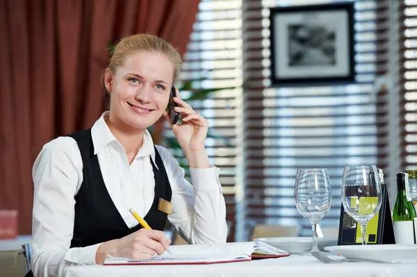 Restaurant manager woman at work place Stock Image