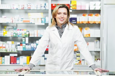 Pharmacy chemist woman in drugstore clipart