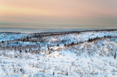 Polar night in mountains in northern tundra clipart