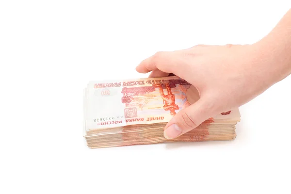Dinheiro em notas de dinheiro russo na mão — Fotografia de Stock
