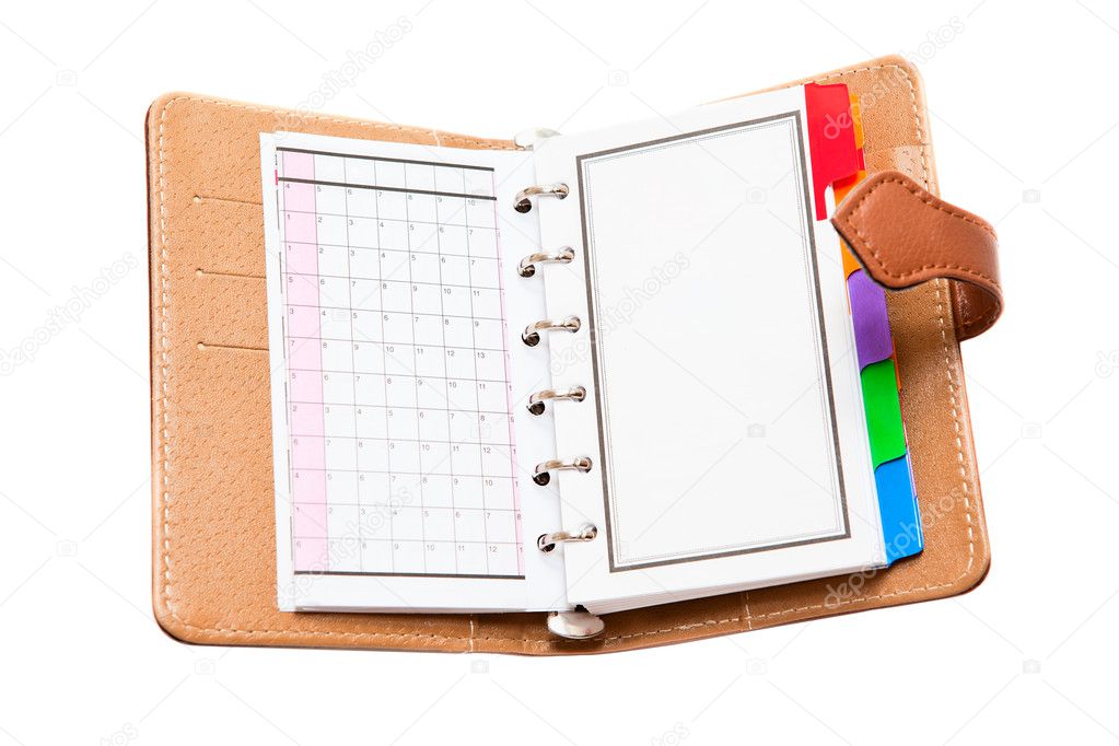 Opened personal organizer isolated on a white background.