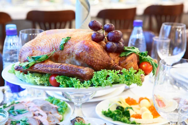 stock image Roast turkey in a dish on the dinner table