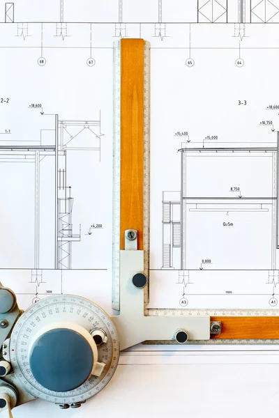 Old-fashioned drawing board with white project blueprint — Stock Photo, Image