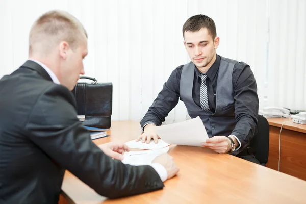 Young business man executives with business documents at work — Stock Photo, Image