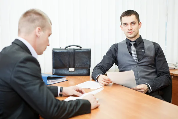 Young business man executives with business documents at work — Stock Photo, Image