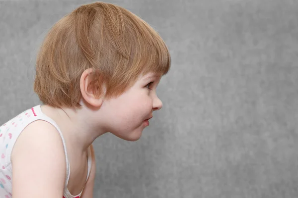 Portrait of small girl in profile with copy space — Stock Photo, Image