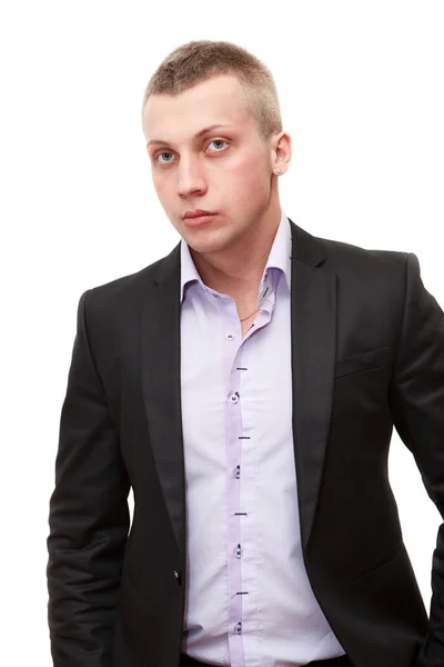 Ritratto di giovane uomo d'affari sicuro di sé con i capelli biondi in piedi su bianco — Foto Stock