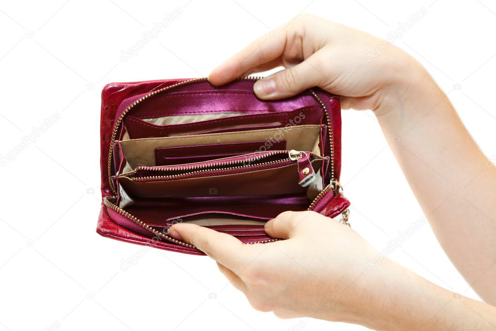 Female hand with empty opened wallet isolated on white background