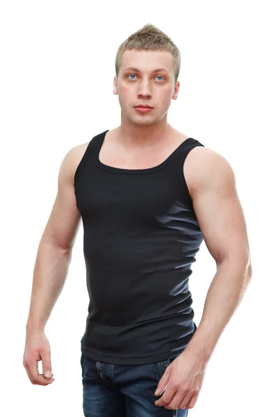 Um homem musculoso caucasiano bonito em t-shirt preta — Fotografia de Stock