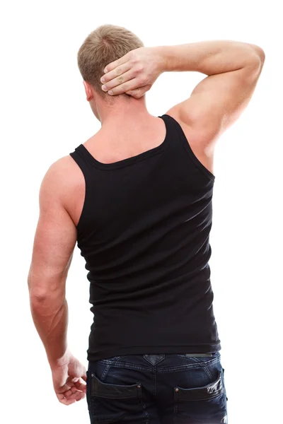 Um belo homem caucasiano com dor no pescoço — Fotografia de Stock