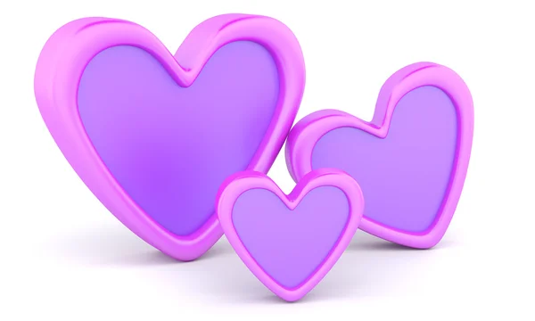 Три фиолетовых сердца — стоковое фото