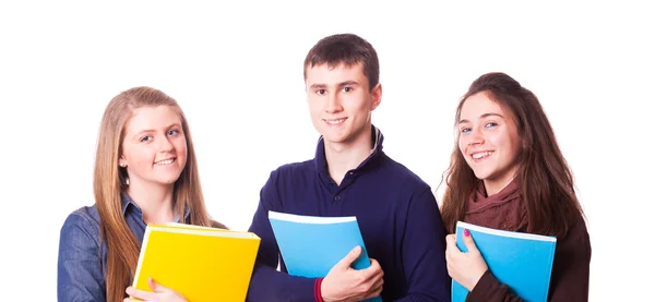 Šťastné dospívající studenty na bílém pozadí — Stock fotografie